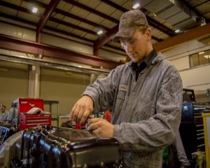 A diesel tech student works on an engine in the diesel classroom at Centralia College.
