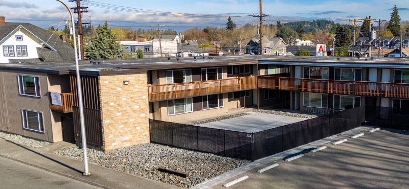 An exterior view of the Silver Street Apartments on a sunny day