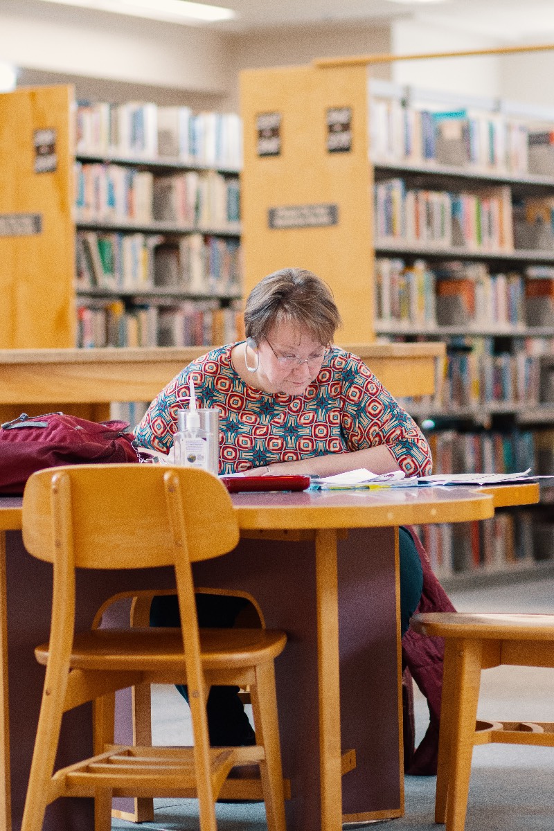 A student studies in the Kirk Library on campus.